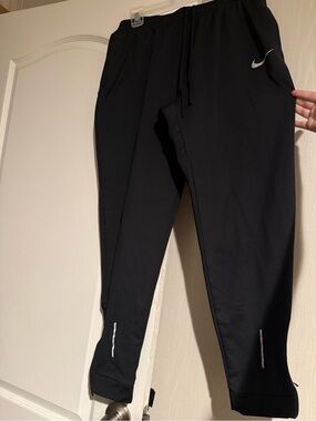 Nike Black Dri-FIT joggers with Swoosh Logo